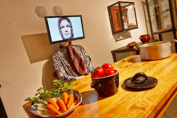 Scene from the Museum in Jersey. Wax Work of Woman and Food