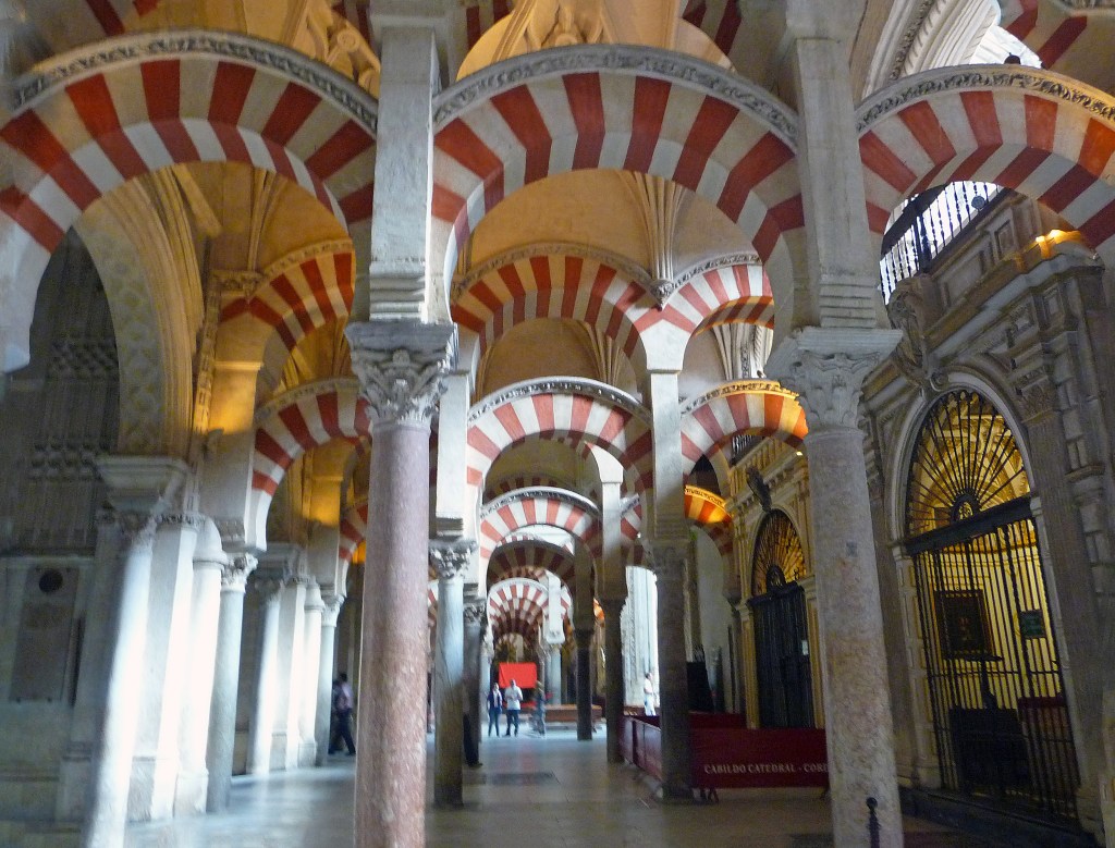 The pillars seem to go on forever. Mezquita, Cordoba, Spain