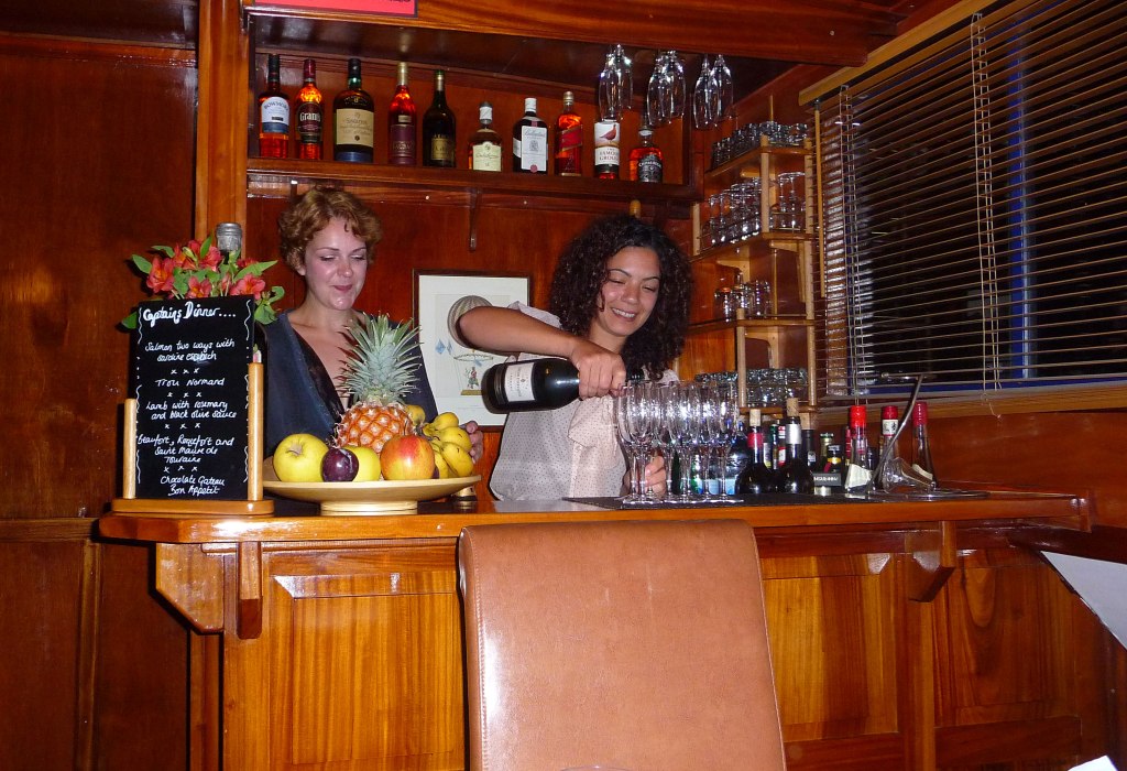 Chef Lauren and hostess Alex prepare pre-dinner drinks.