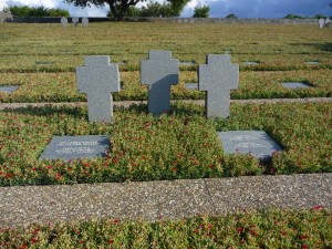 Three crosses and two plaques.