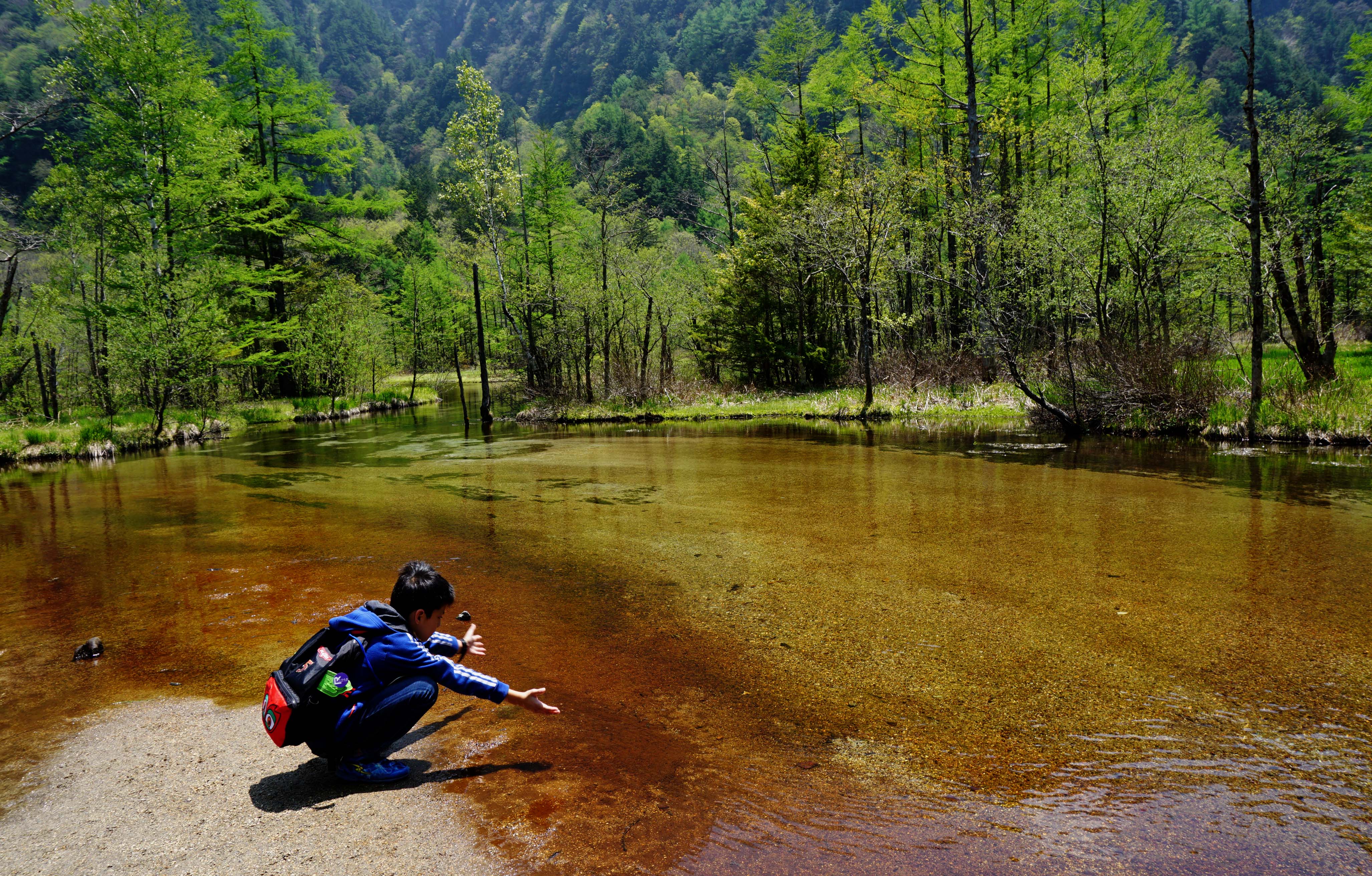 Japanese boy at Tsaio Pond