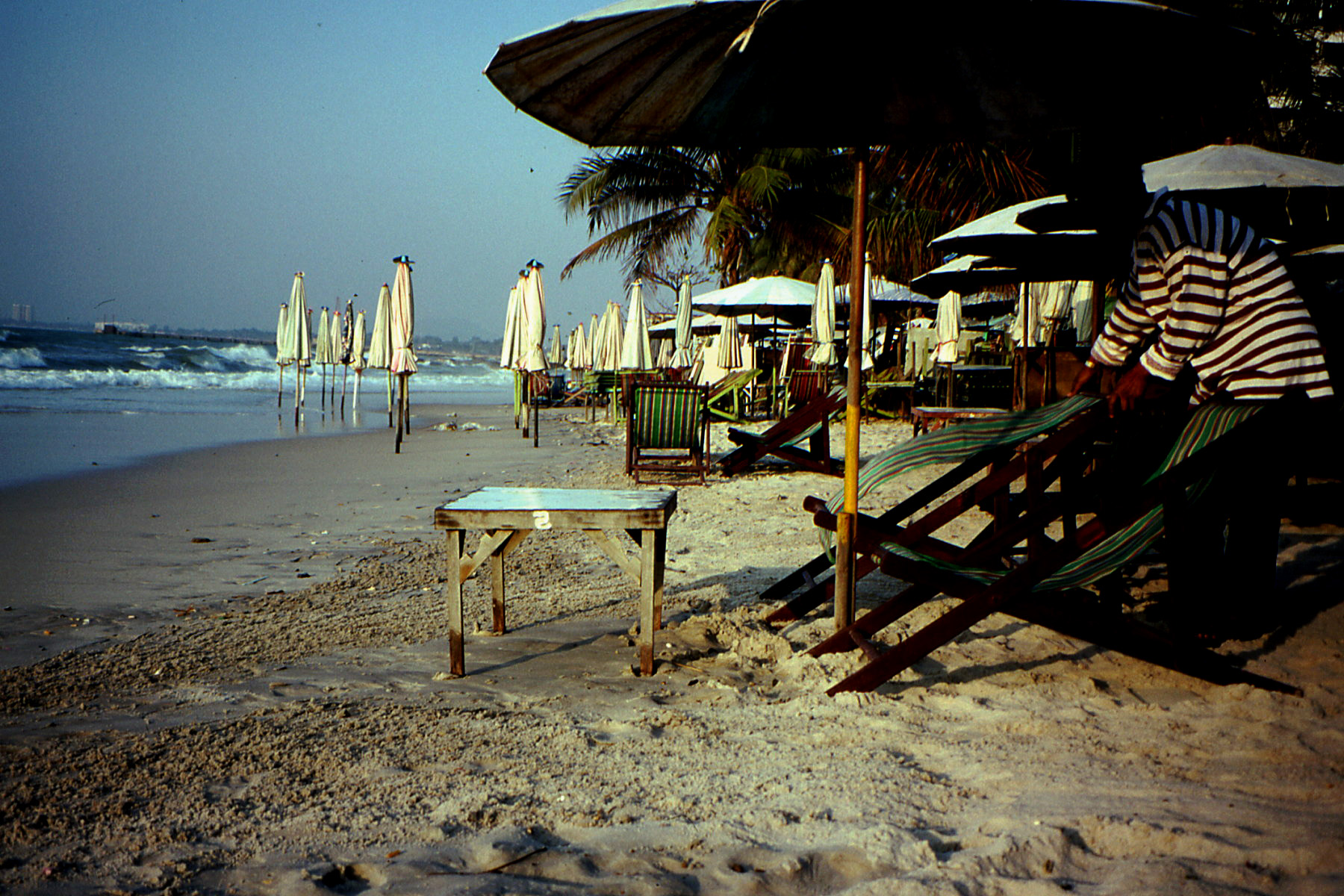 Setting out the Deck Chairs, Dawn at Hua Hin Beach, Thailand