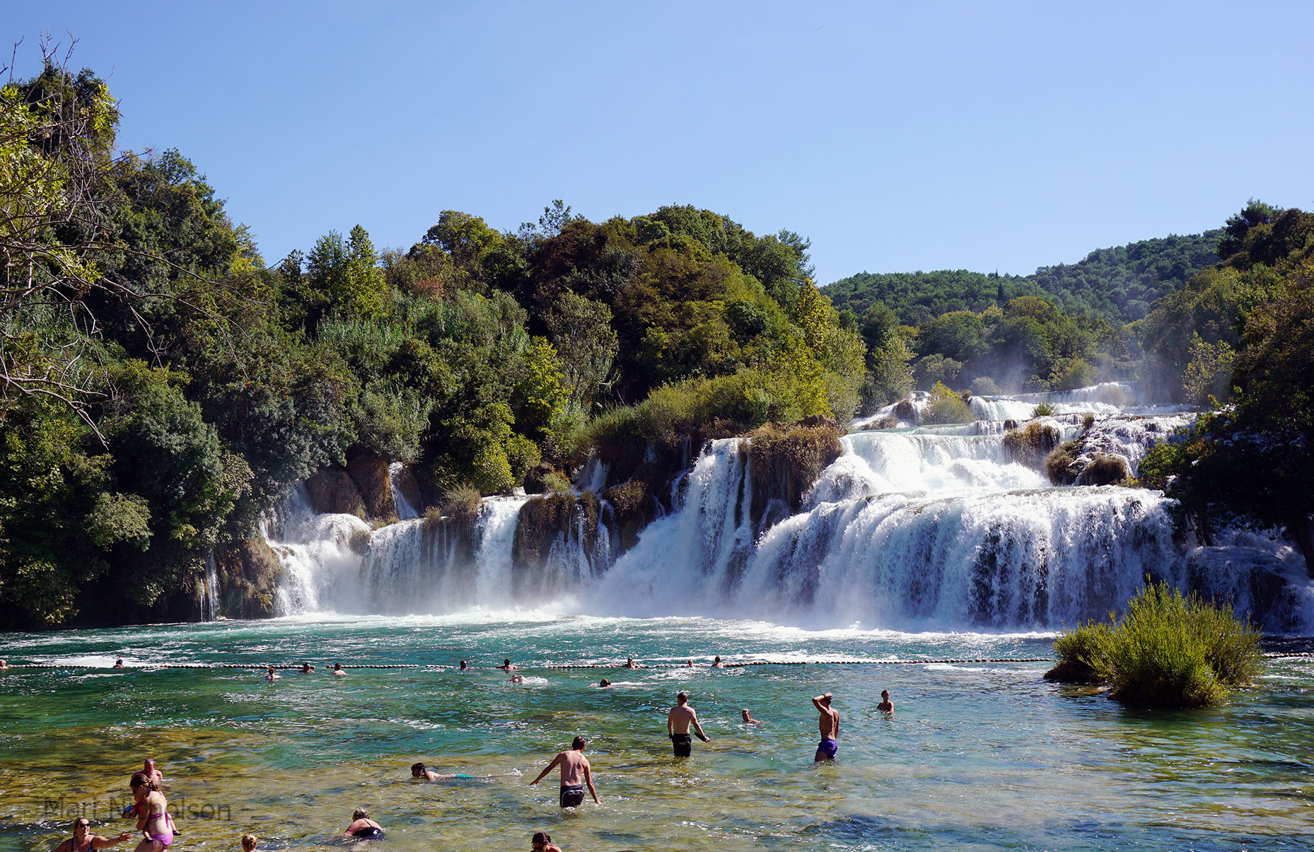 enjoying-swimming-in-waterfalls-at-kyka-national-park