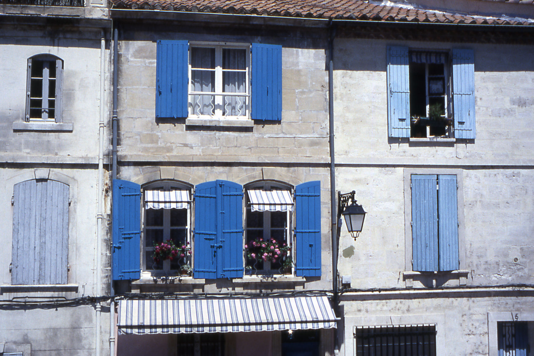 Blue shutters on house in Arles